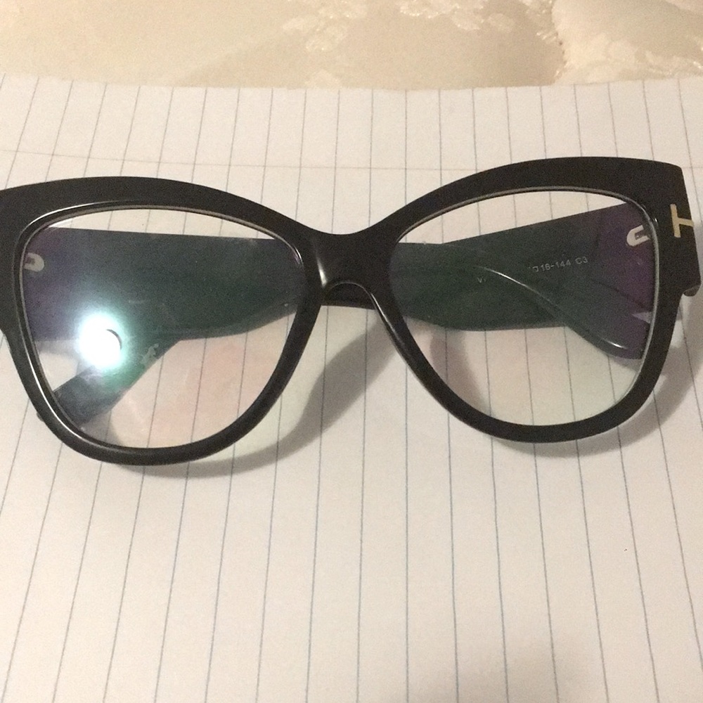 Black sunglasses with beautiful glare once sun hits them